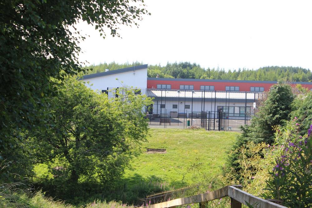 View from Braehead Road across the burn to the back of Coalburn Primary School